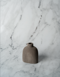 Small gray stone-look bud vase