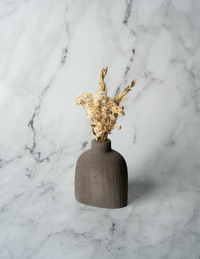 Small gray stone-look bud vase