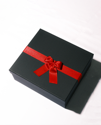 Eighteen red preserved roses in a heart-shaped box